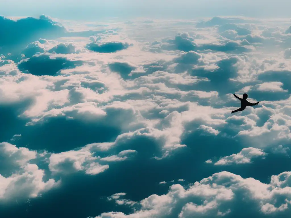 Person with outstretched arms flying over clouds, symbolizing the freedom and transcendence associated with flying dreams