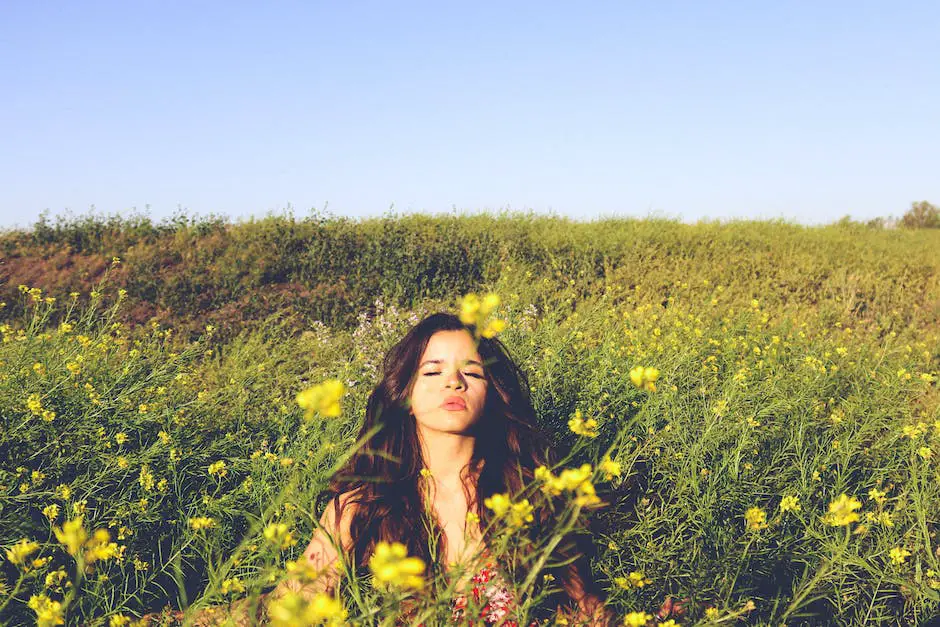 A person lying in a field with their eyes closed, surrounded by symbolic imagery representing change and transformation.